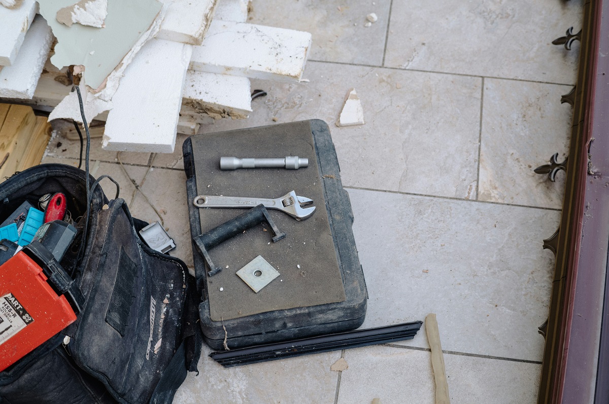 handyman tools on tiled flooring