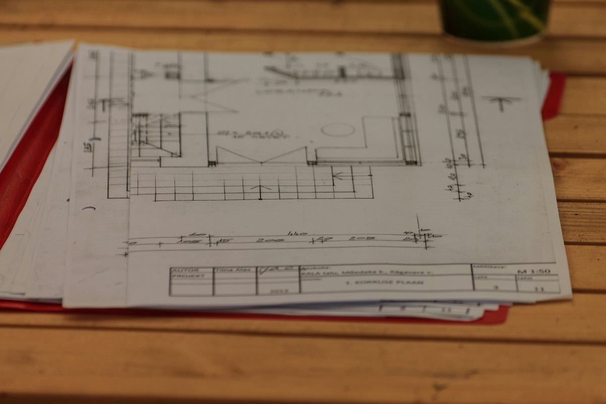 blueprint on a wooden surface